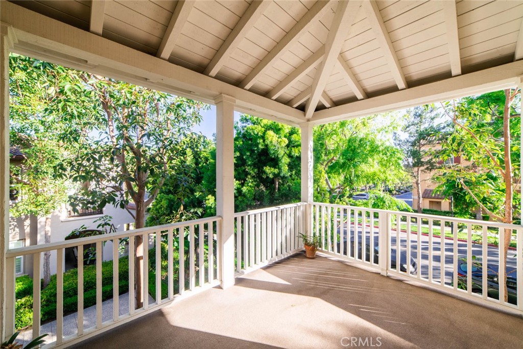 368 Quail Ridge Irvine, CA 92603 - Photo 20 of 23 a view of a roof deck with wooden floor and fence