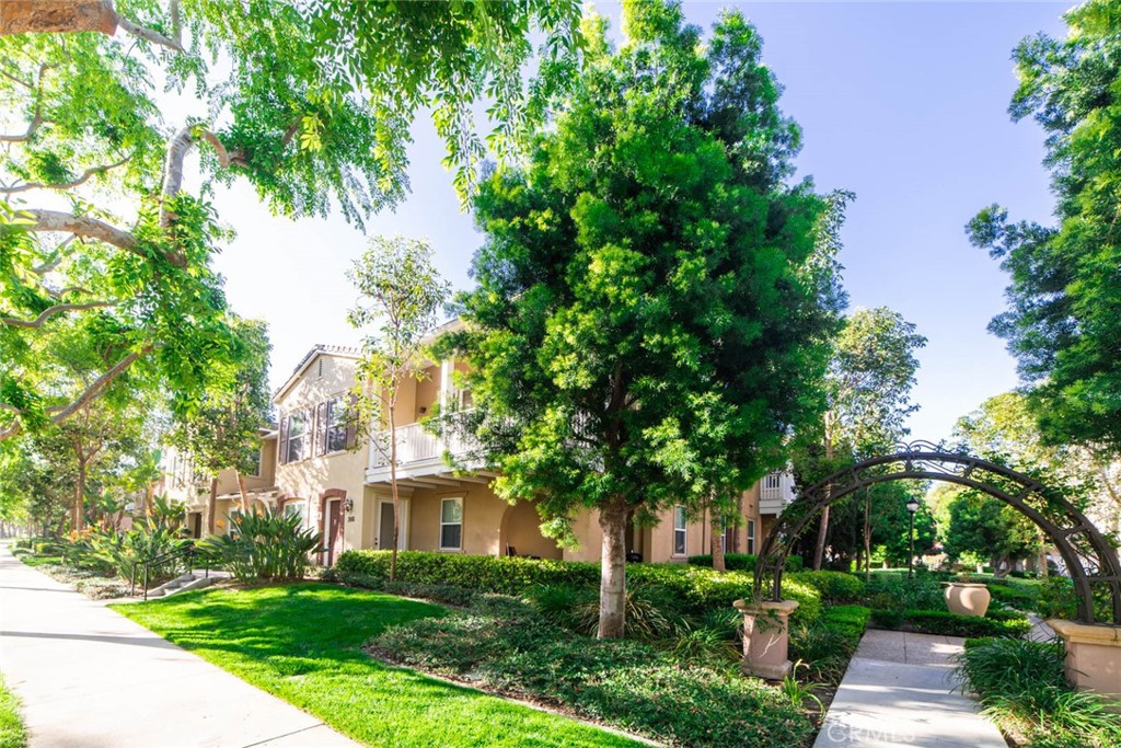 368 Quail Ridge Irvine, CA 92603 - Photo 22 of 23 a front view of a house with a yard