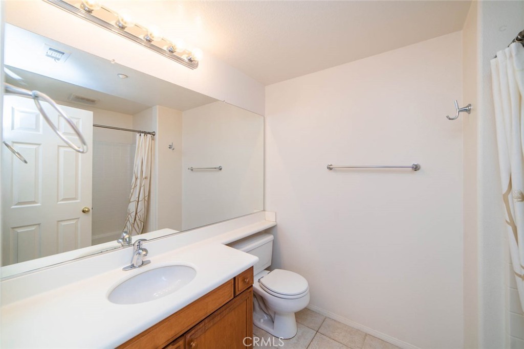 368 Quail Ridge Irvine, CA 92603 - Photo 9 of 23 a bathroom with a sink toilet and vanity