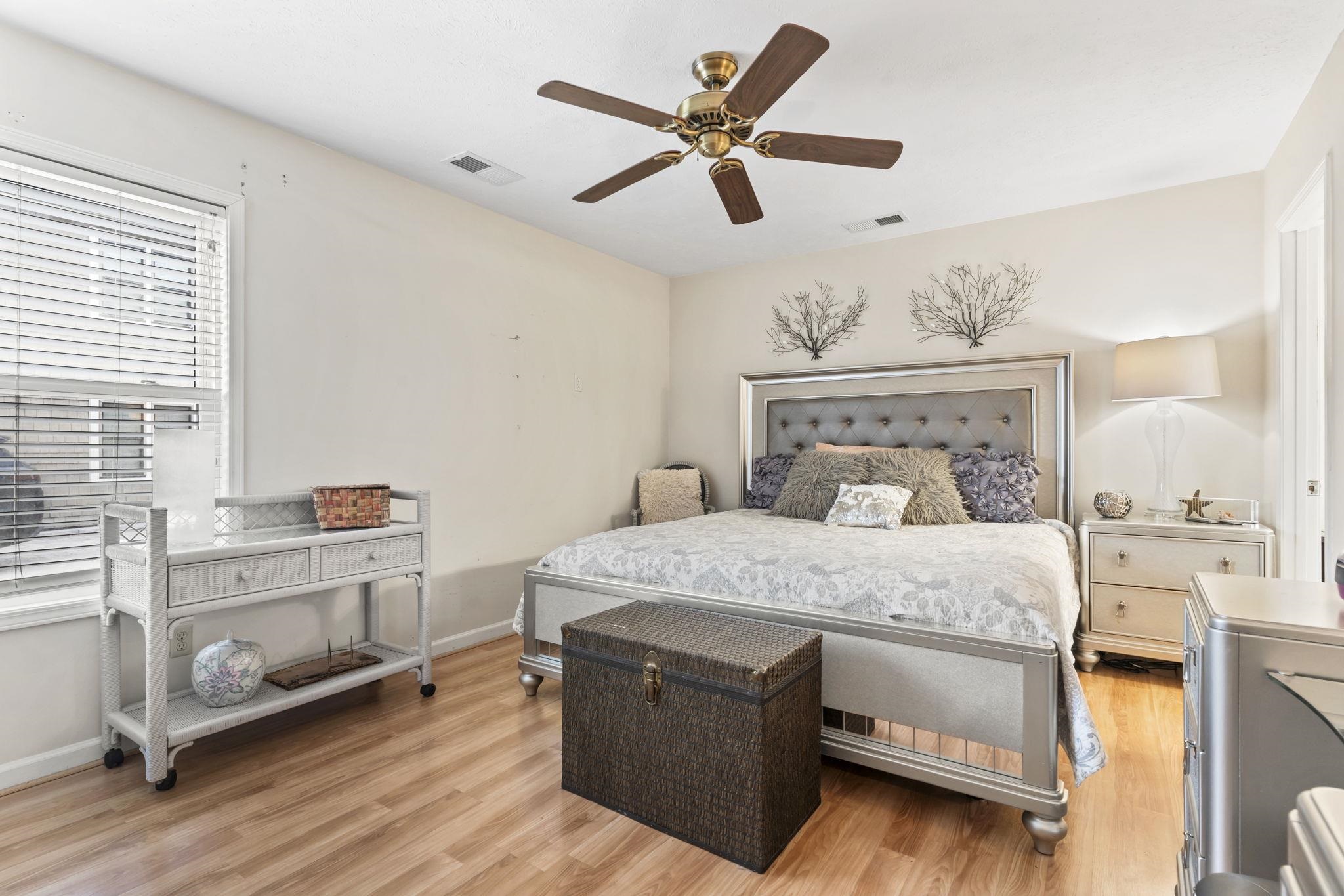 811 9th Avenue South North Myrtle Beach, SC 29582 - Photo 17 of 35 Bedroom featuring light wood-style floors and a ceiling fan