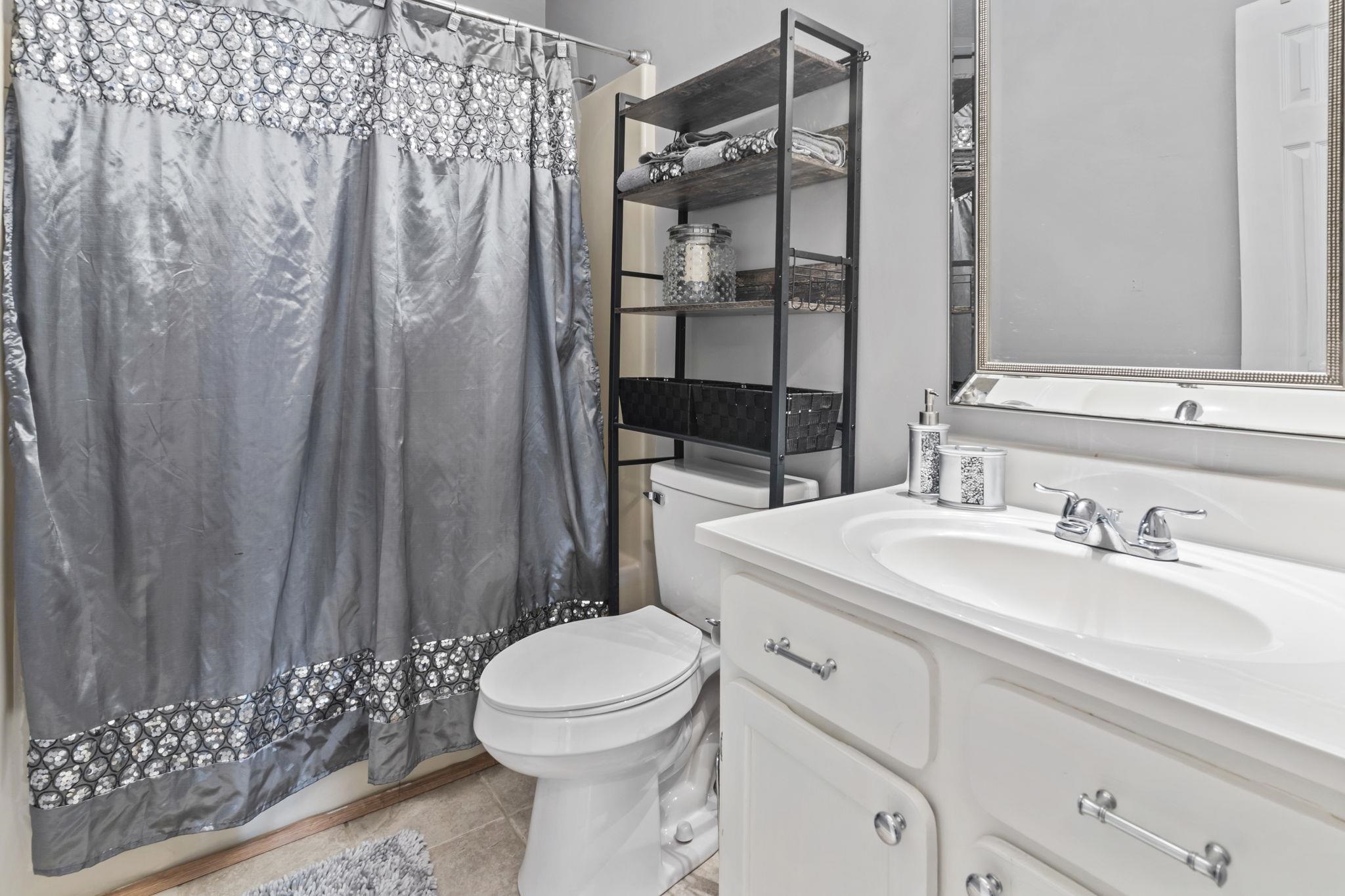 811 9th Avenue South North Myrtle Beach, SC 29582 - Photo 23 of 35 Bathroom with vanity and light tile patterned floors