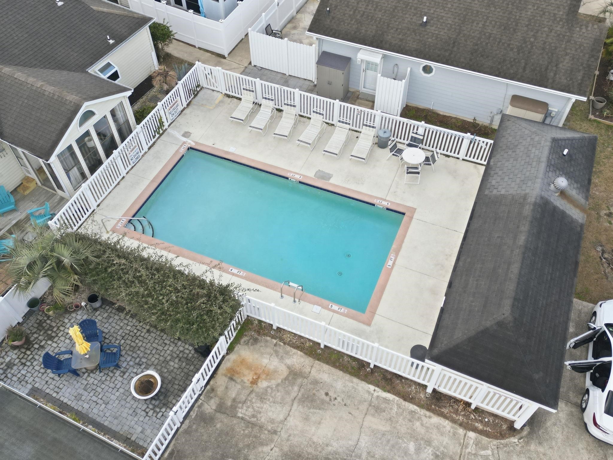 811 9th Avenue South North Myrtle Beach, SC 29582 - Photo 31 of 35 Aerial view of a pool