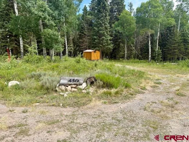 a backyard of a house with seating space