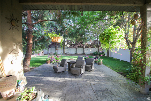 288 525 South Providence, UT 84332 - Photo 48 of 71 Fenced backyard with a patio area