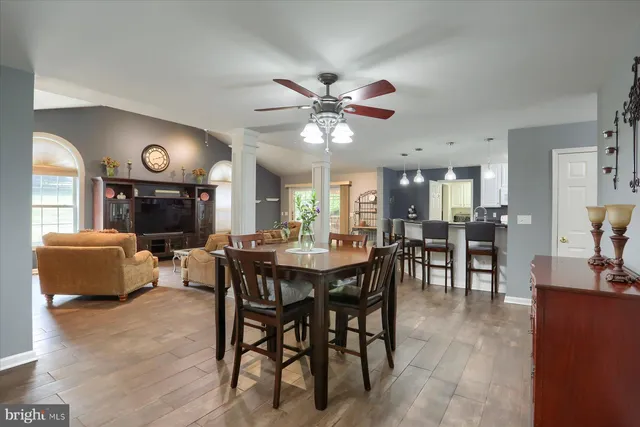 a view of a dining room with furniture