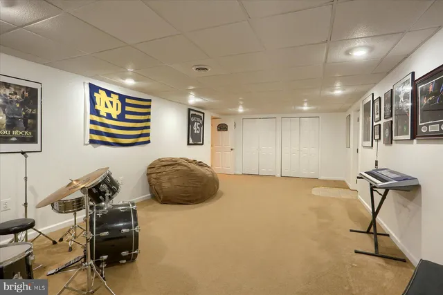 a livingroom with furniture and a window