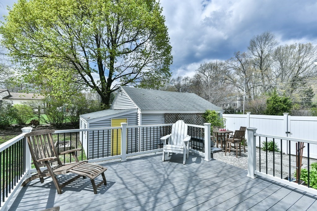 243 Beverly Road Worcester, MA 01605 - Photo 14 of 41 a view of a patio with a table and chairs