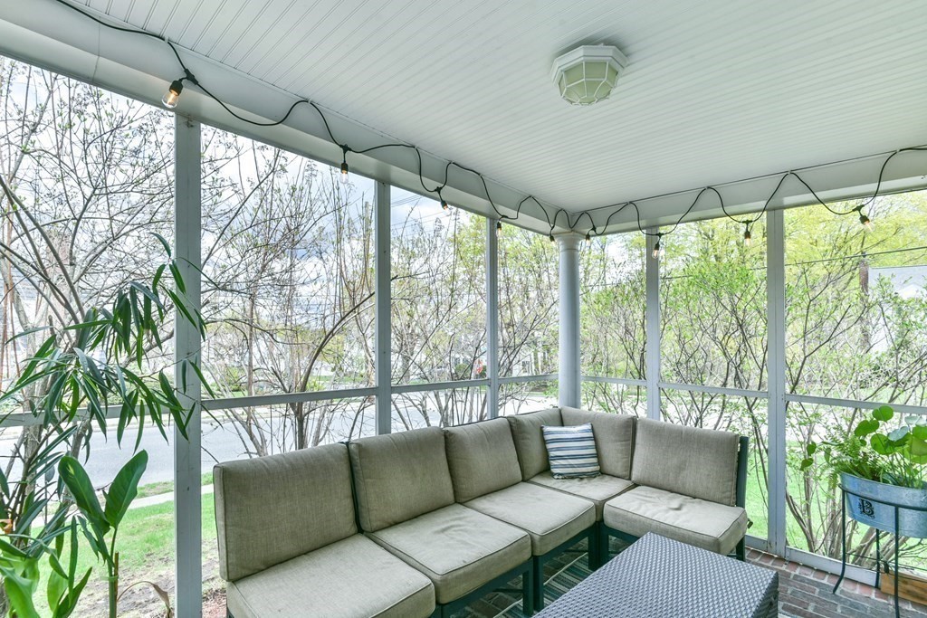 243 Beverly Road Worcester, MA 01605 - Photo 17 of 41 a living room with furniture and a window