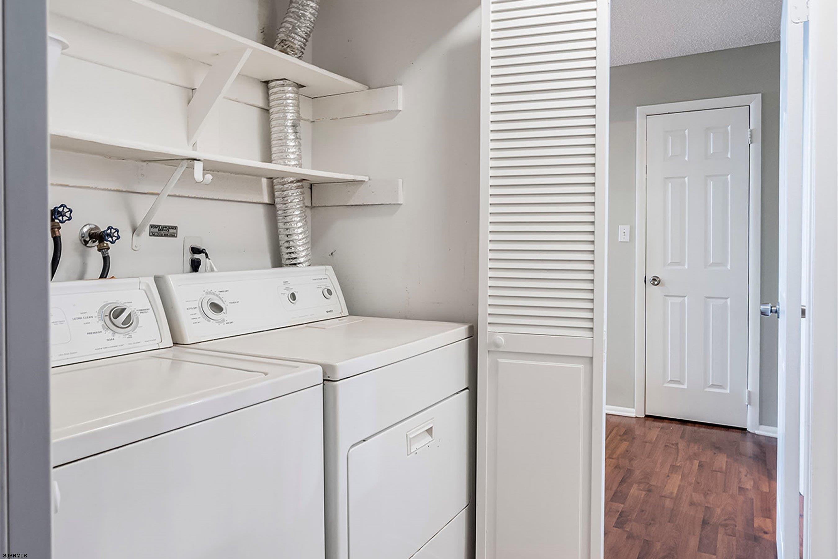 209 Daisy Court, Unit 209 Jackson, NJ 08527 - Photo 17 of 26 a utility room with dryer and washer