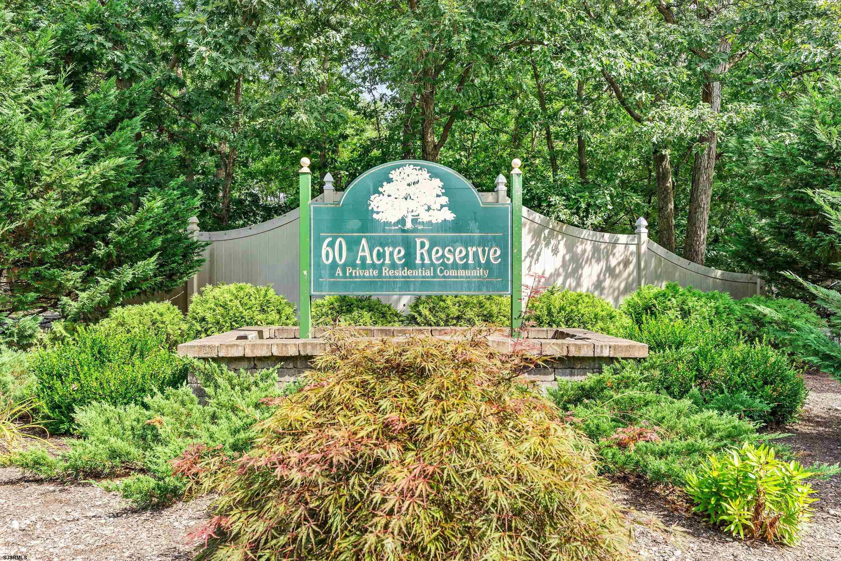 209 Daisy Court, Unit 209 Jackson, NJ 08527 - Photo 20 of 26 a sign on the side of the road