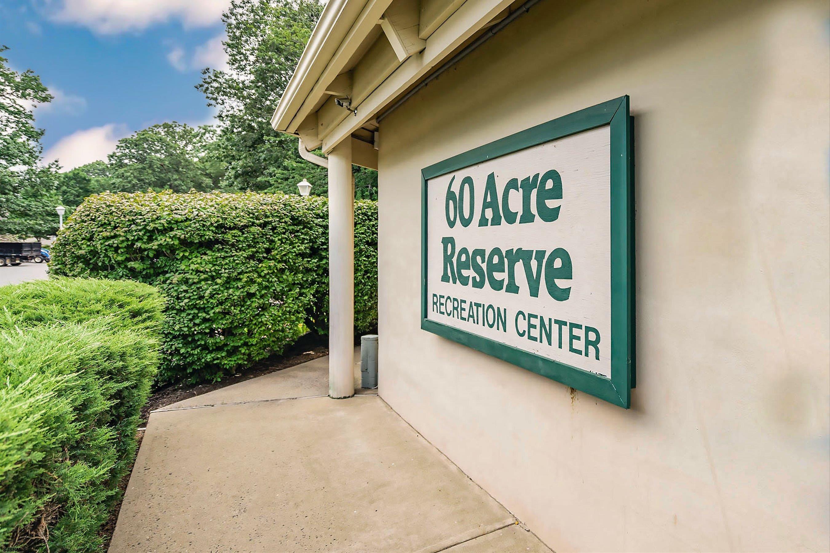 209 Daisy Court, Unit 209 Jackson, NJ 08527 - Photo 22 of 26 a sign that is on the side of a building