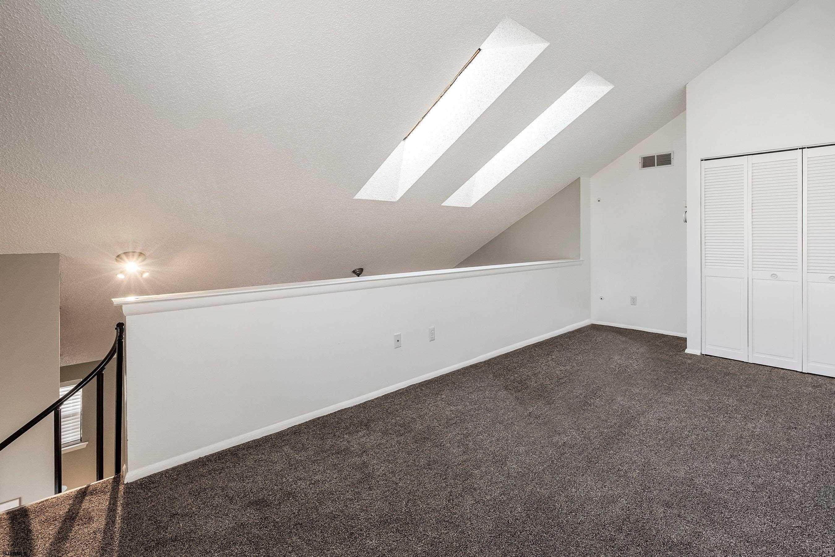 209 Daisy Court, Unit 209 Jackson, NJ 08527 - Photo 9 of 26 a view of an empty room