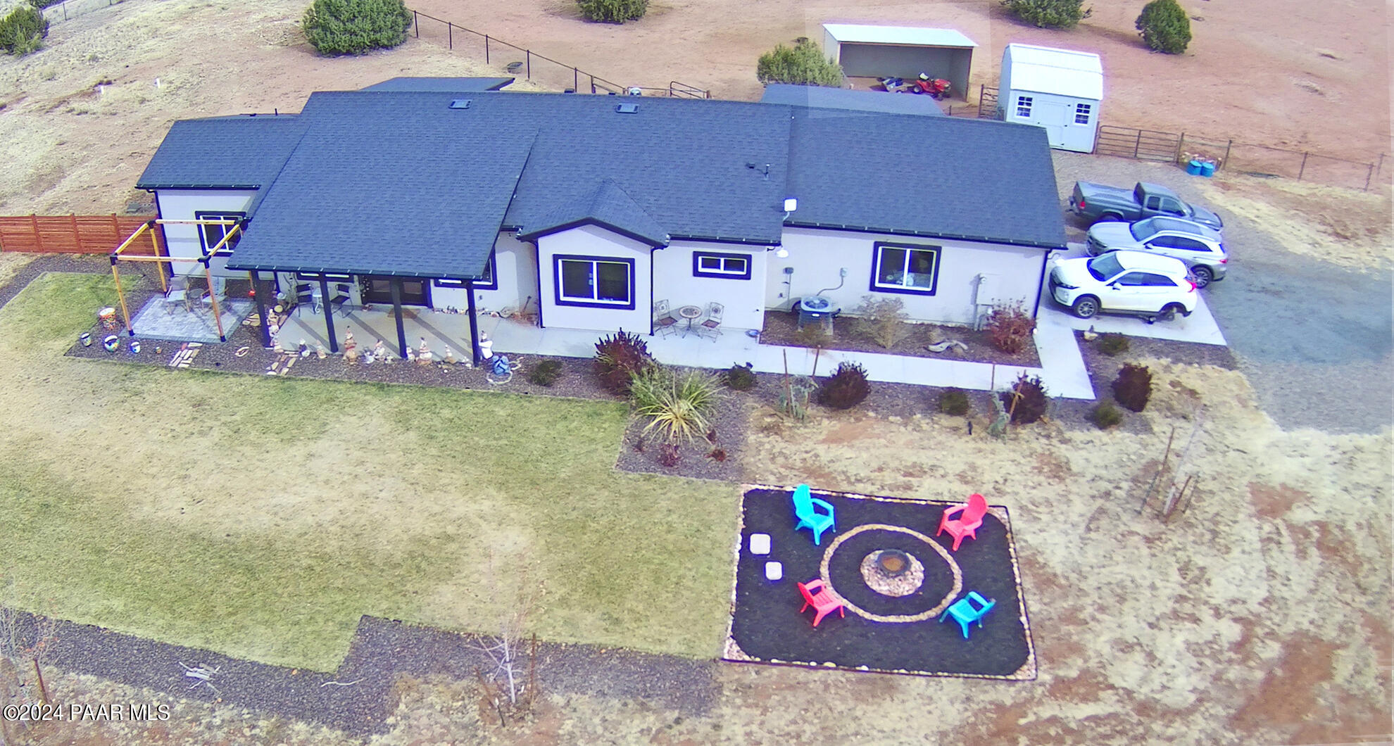 Terrell Drone HsFrontFirePitRunInShedBGo