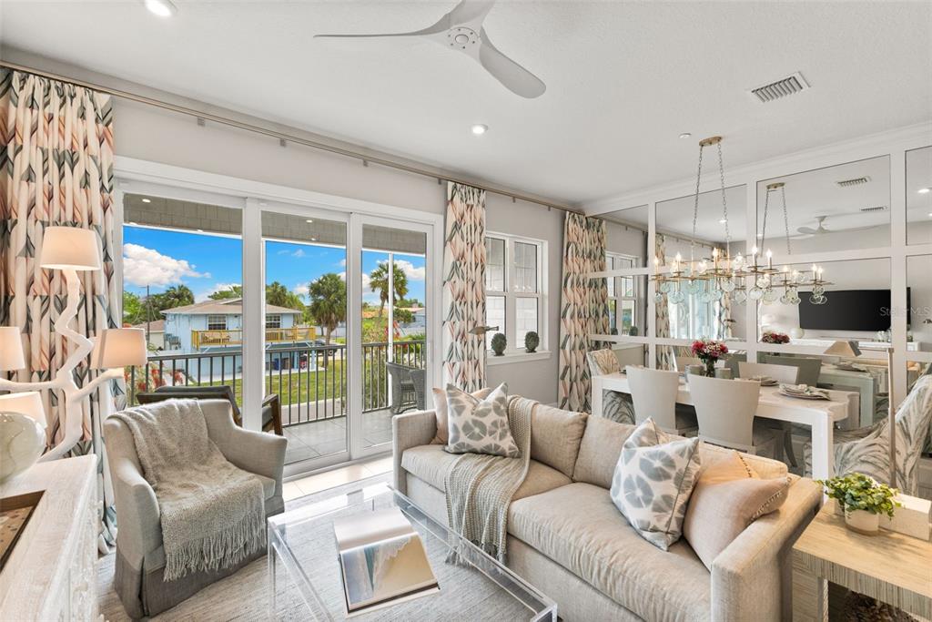 2503 Coral Court Indian Rocks Beach, FL 33785 - Photo 12 of 42 a living room with furniture and a large window