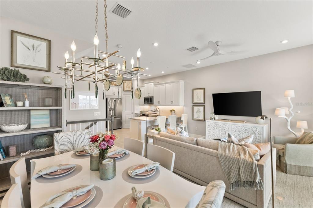 2503 Coral Court Indian Rocks Beach, FL 33785 - Photo 15 of 42 a living room with stainless steel appliances furniture and a flat screen tv