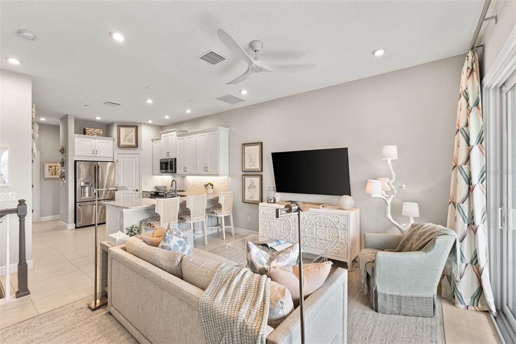 2503 Coral Court Indian Rocks Beach, FL 33785 - Photo 16 of 42 a living room with furniture and a flat screen tv