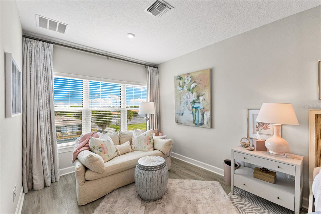 2503 Coral Court Indian Rocks Beach, FL 33785 - Photo 24 of 42 a living room with furniture and a window