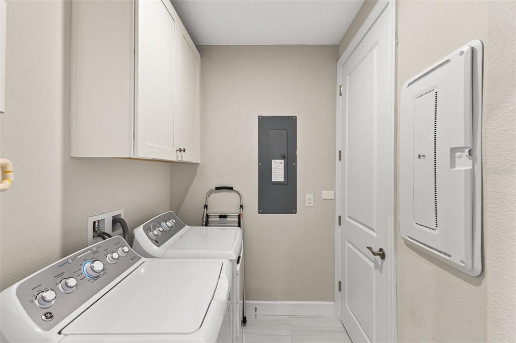 2503 Coral Court Indian Rocks Beach, FL 33785 - Photo 30 of 42 a utility room with dryer and washer