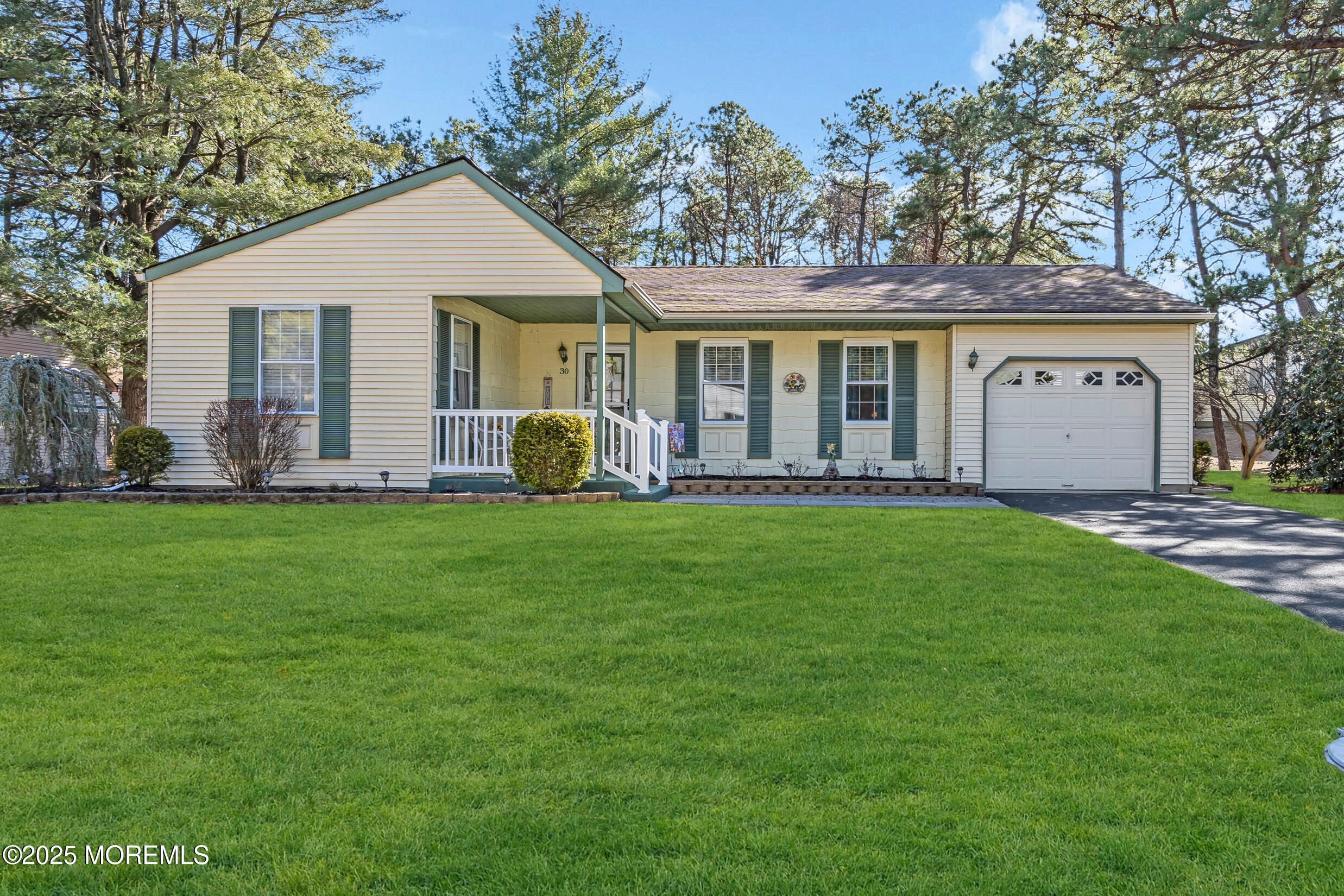 30 Sunset Road Whiting, NJ 08759 - Photo 1 of 31 a front view of house with yard and green space