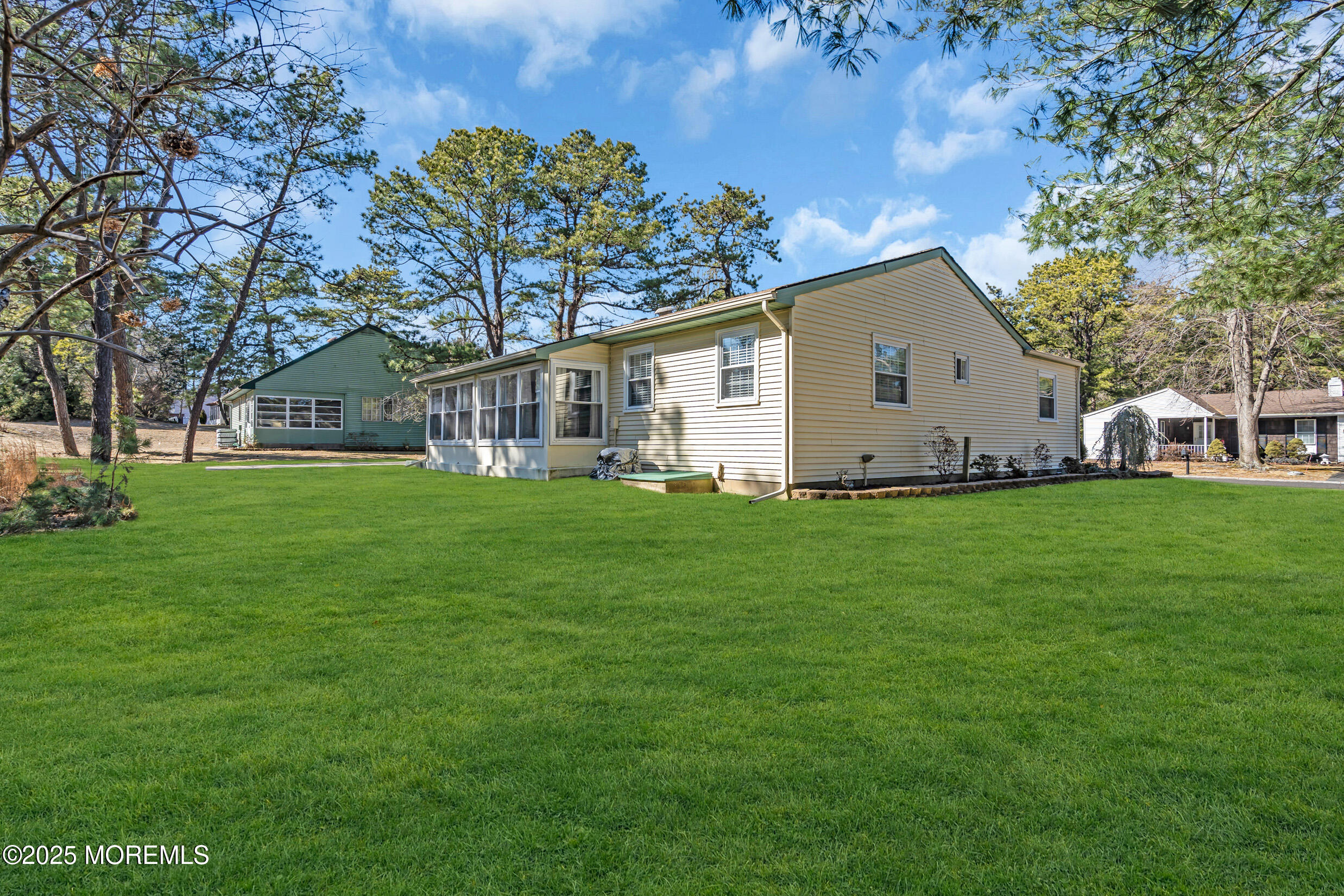 30 Sunset Road Whiting, NJ 08759 - Photo 30 of 31 a front view of house with yard and green space