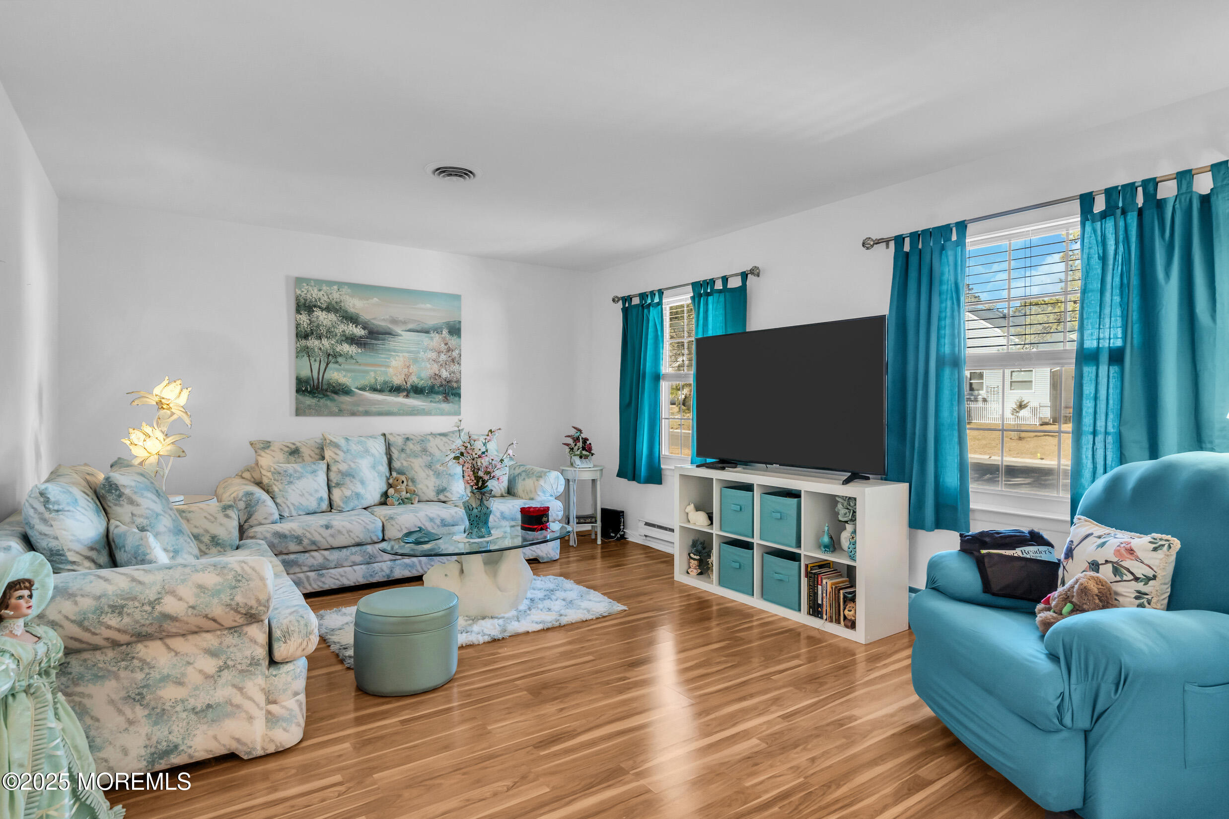 30 Sunset Road Whiting, NJ 08759 - Photo 3 of 31 a living room with furniture and a flat screen tv