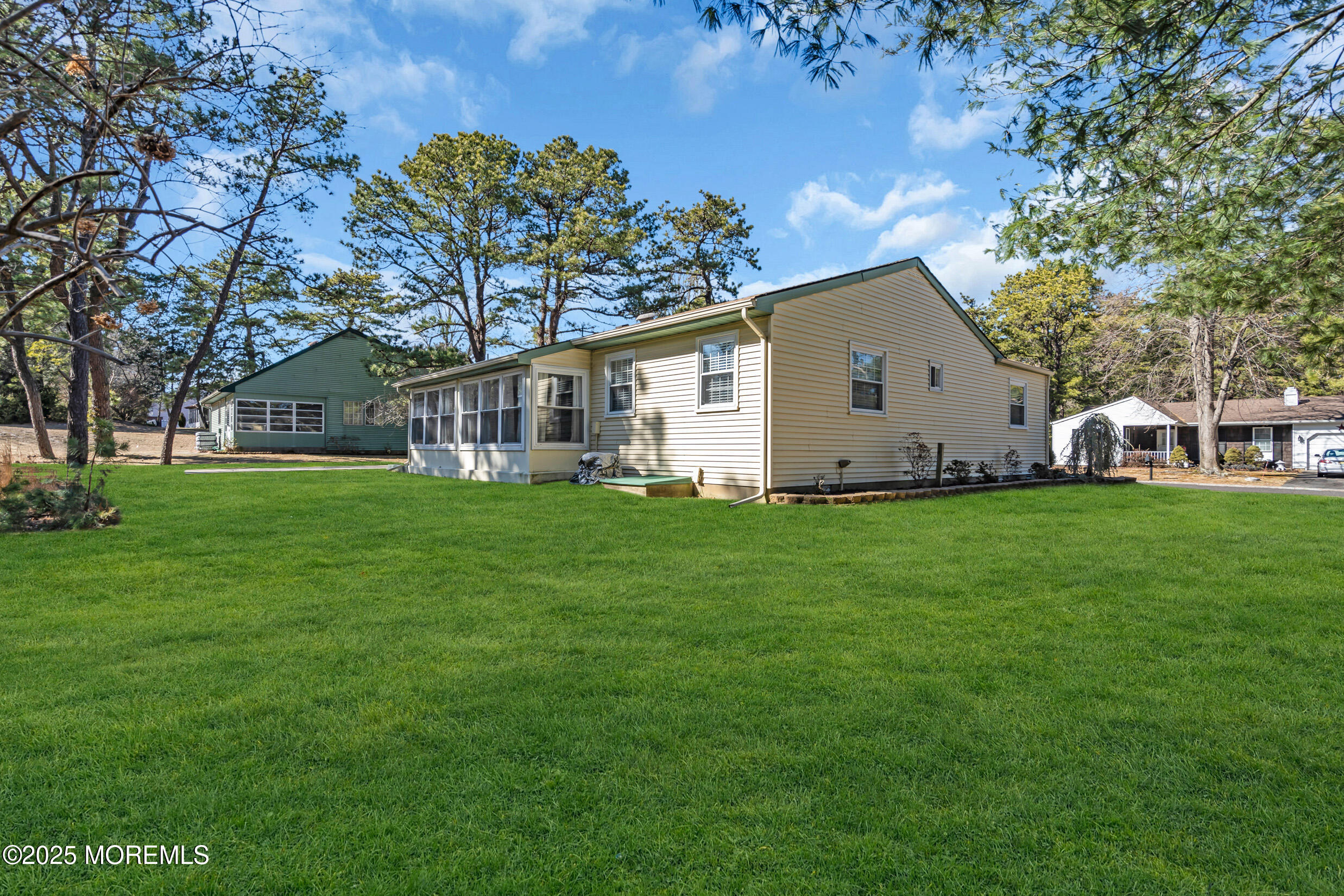 30 Sunset Road Whiting, NJ 08759 - Photo 31 of 31 a view of house with backyard