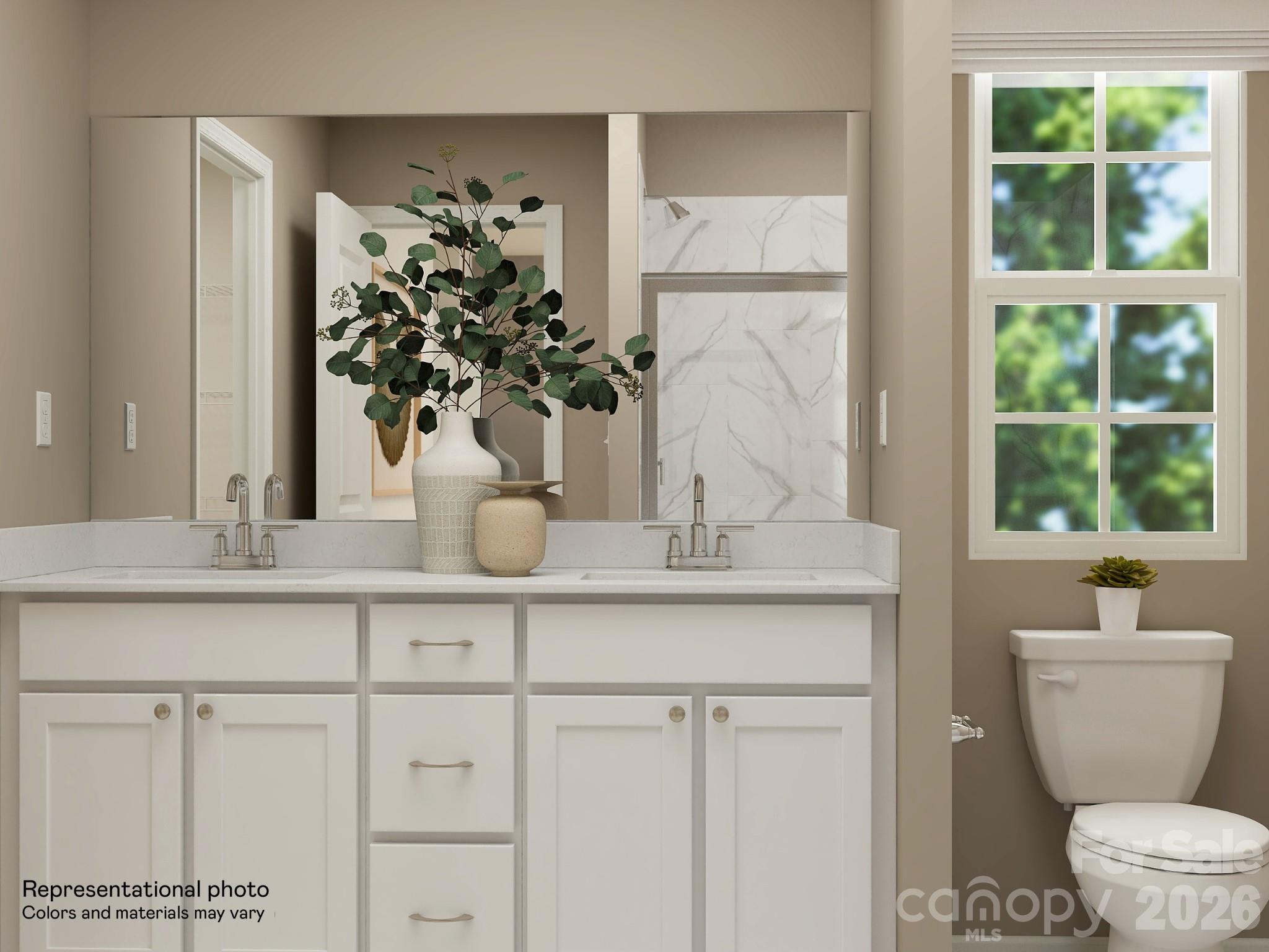 7014 Juneberry Way Maiden, NC 28650 - Photo 21 of 31 a bathroom with a toilet sink and mirror