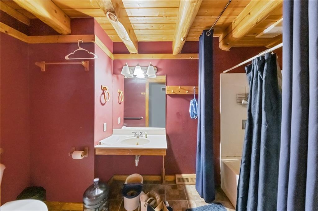 145 Snyder Drive Rochester, PA 15074 - Photo 15 of 37 a bathroom with a sink and mirror