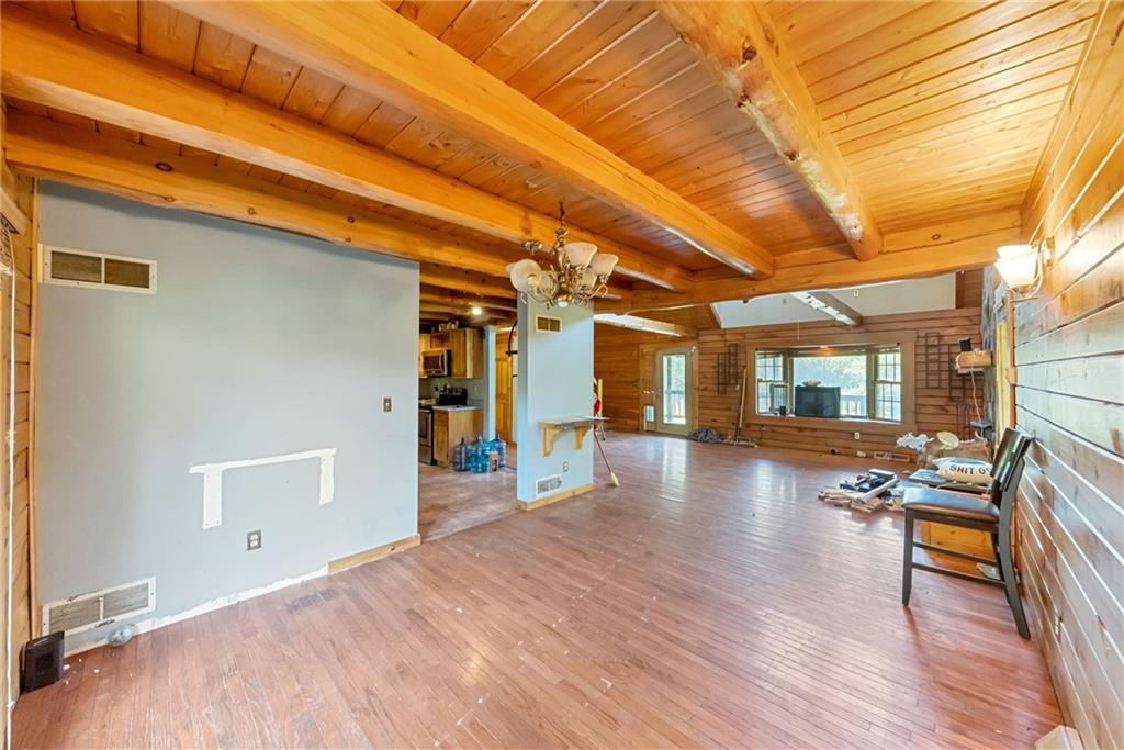 145 Snyder Drive Rochester, PA 15074 - Photo 18 of 37 a view of a livingroom with furniture and wooden floor