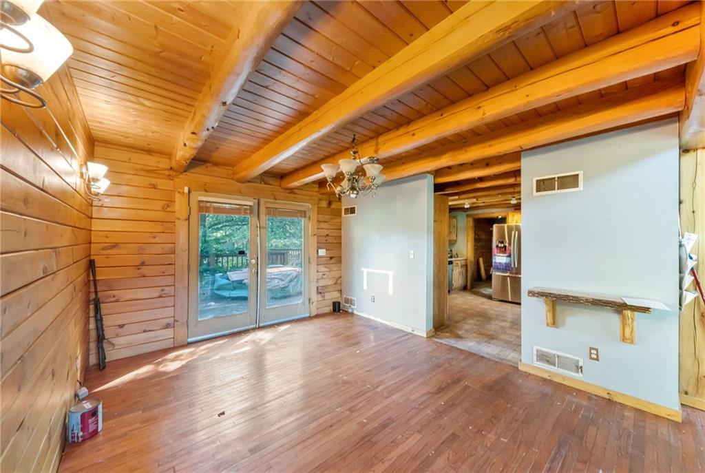145 Snyder Drive Rochester, PA 15074 - Photo 19 of 37 an empty room with wooden floor and windows