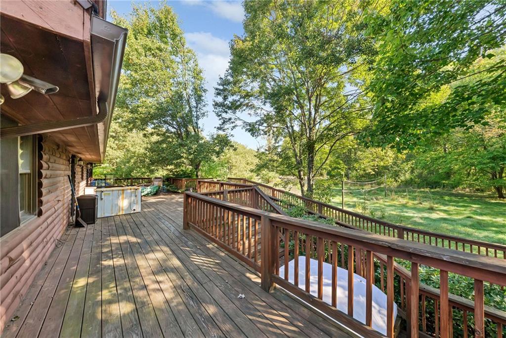 145 Snyder Drive Rochester, PA 15074 - Photo 2 of 37 a view of balcony with wooden floor and fence