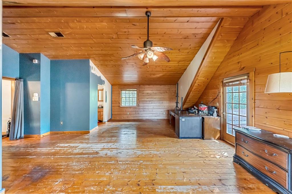 145 Snyder Drive Rochester, PA 15074 - Photo 24 of 37 a view of a livingroom with wooden floor and a window