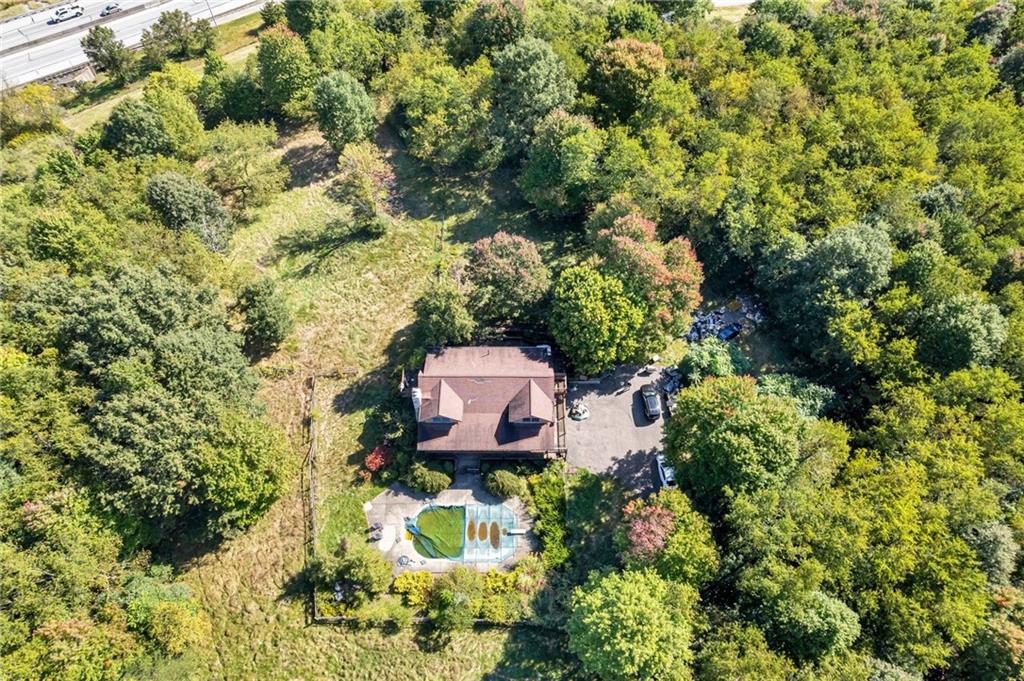 145 Snyder Drive Rochester, PA 15074 - Photo 31 of 37 an aerial view of a house with a yard and swimming pool