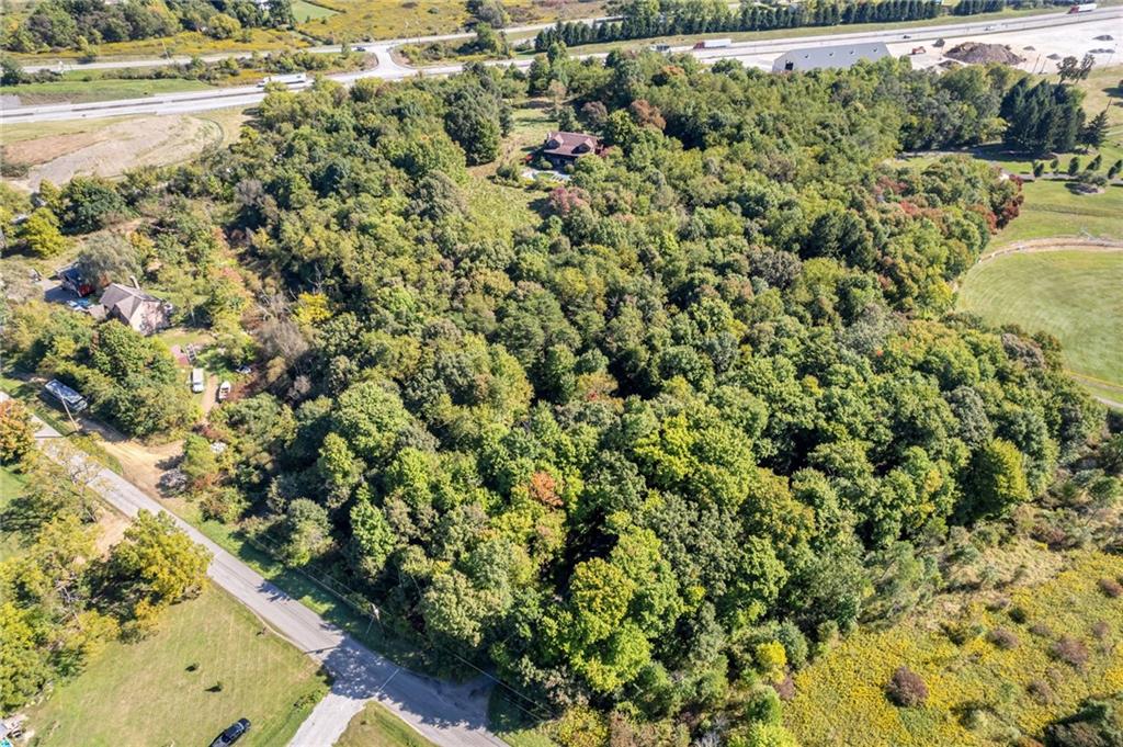 145 Snyder Drive Rochester, PA 15074 - Photo 32 of 37 a view of a yard with a tree