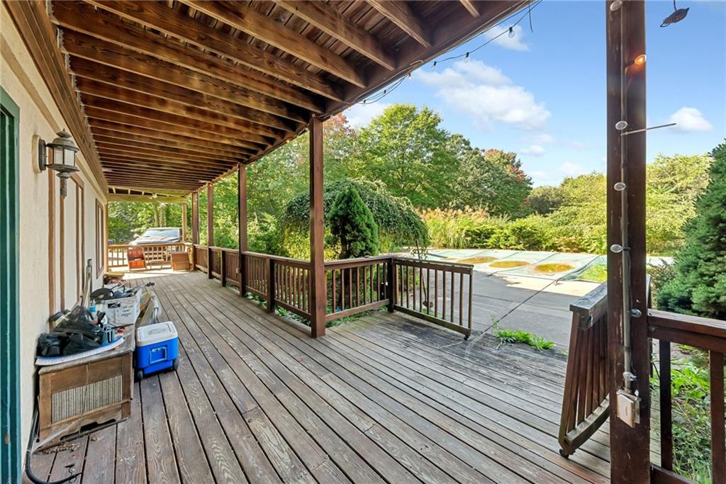 145 Snyder Drive Rochester, PA 15074 - Photo 5 of 37 a view of a balcony with wooden floor