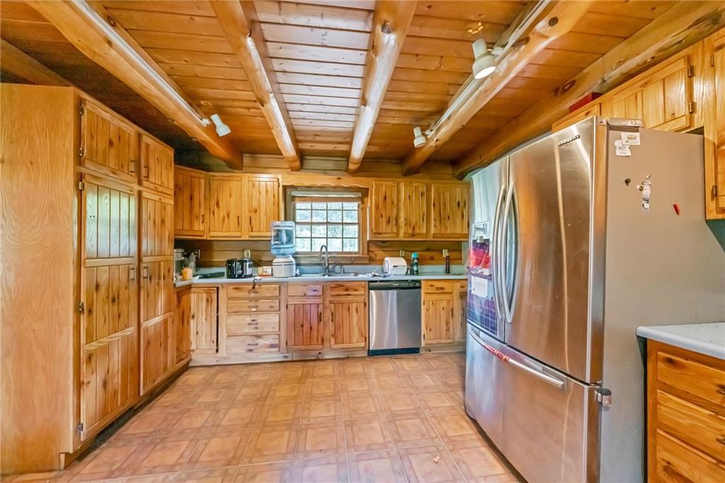 145 Snyder Drive Rochester, PA 15074 - Photo 10 of 37 a kitchen with stainless steel appliances granite countertop a refrigerator and a sink