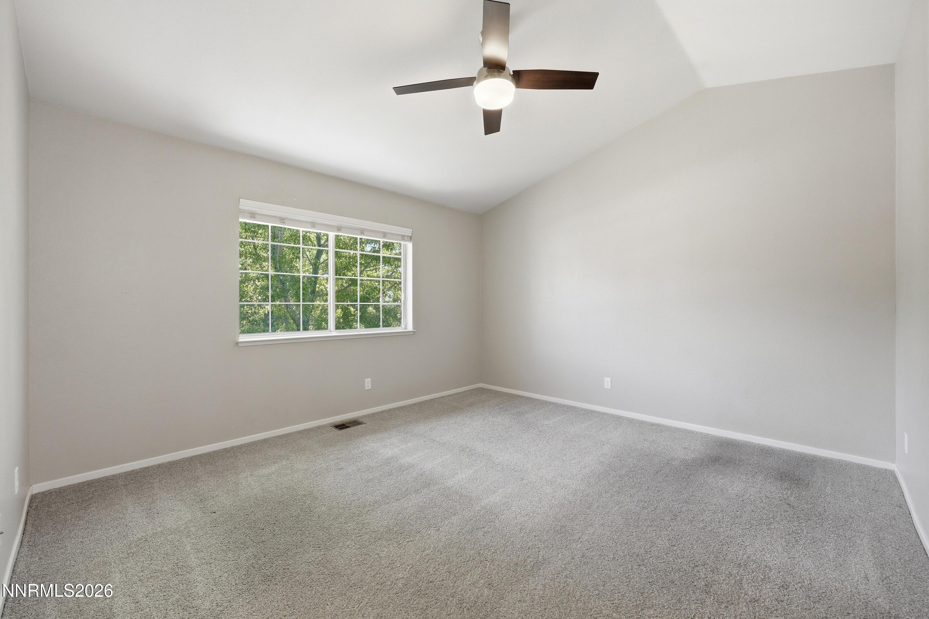 1899 Tuolumne Drive Reno, NV 89523 - Photo 19 of 44 an empty room with windows