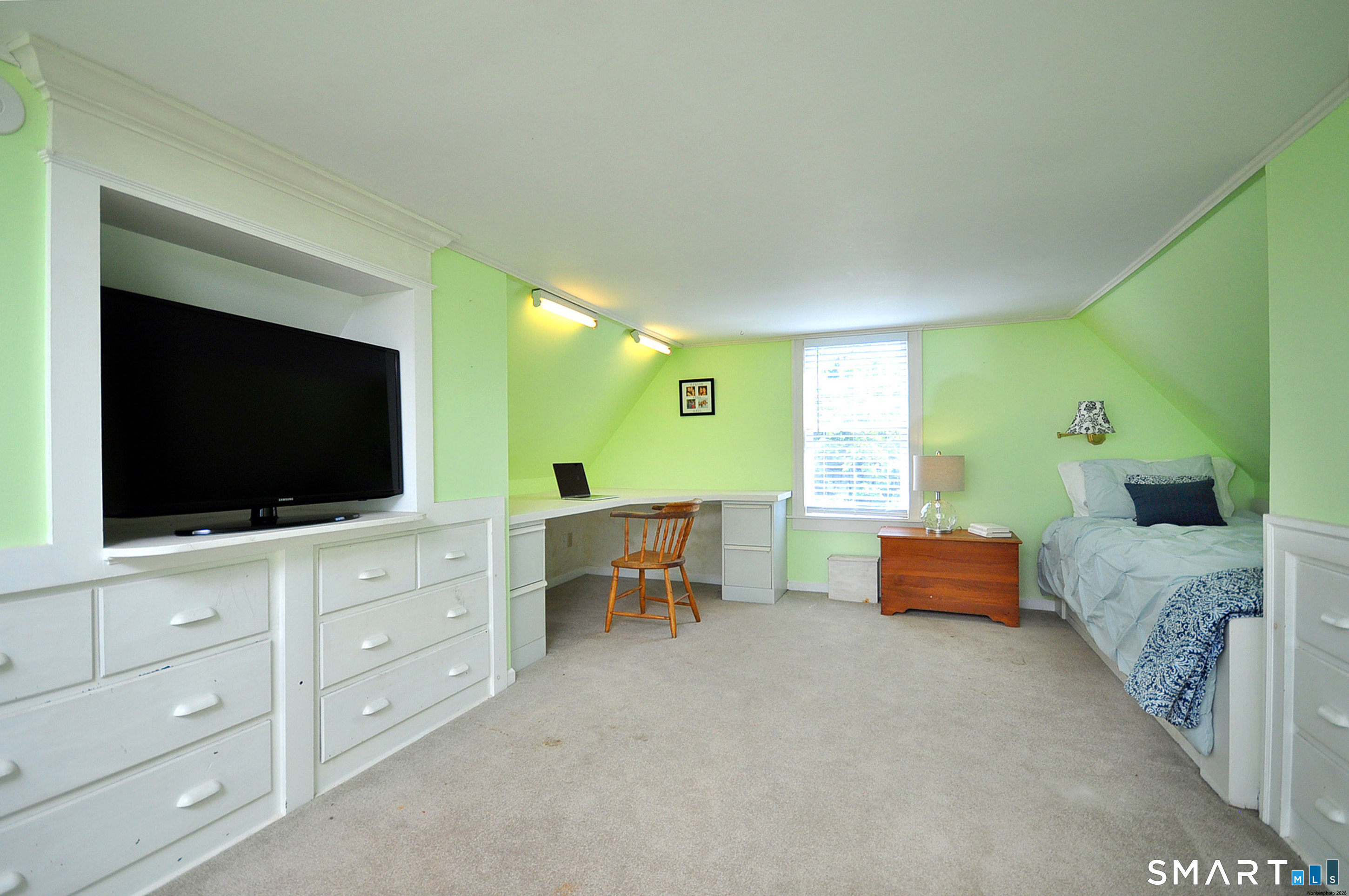 371 North Main Street Suffield, CT 06078 - Photo 33 of 39 a bedroom with furniture and a flat screen tv