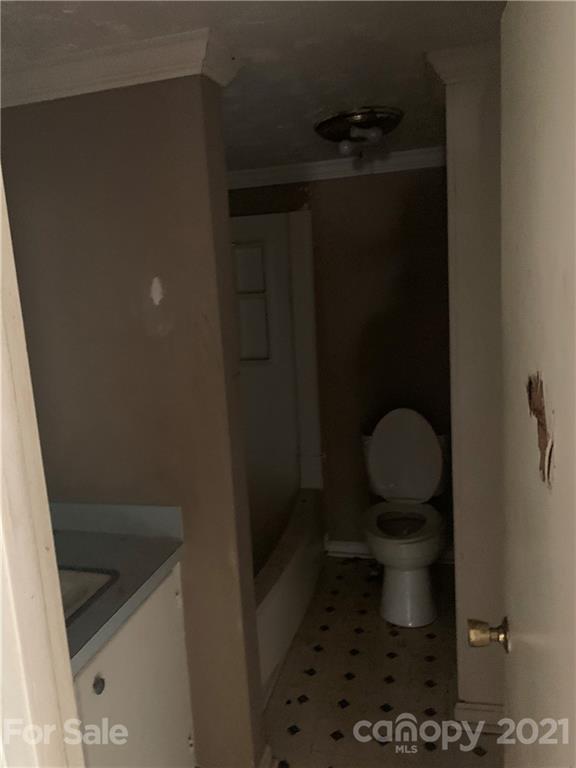 621 North Mountain Street Cherryville, NC 28021 - Photo 9 of 10 a bathroom with a sink and toilet