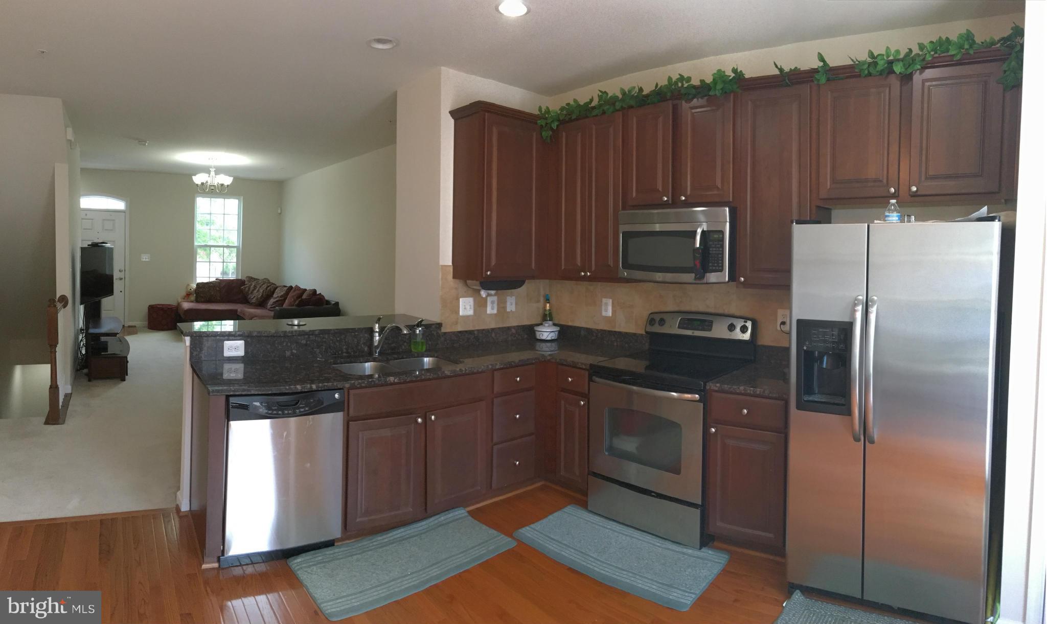 7208 Abbey Road Elkridge, MD 21075 - Photo 4 of 19 Kitchen with Stainless Steel Appliances