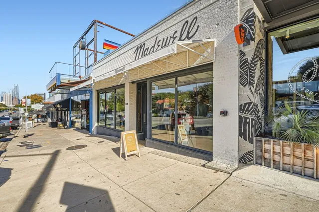 a view of a park with welcome board