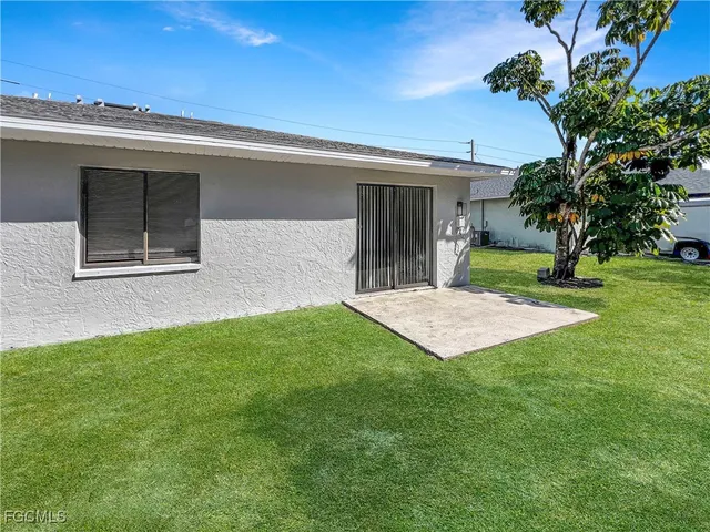 a house view with a garden space