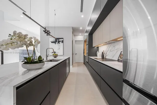 a dining room with furniture and stairs
