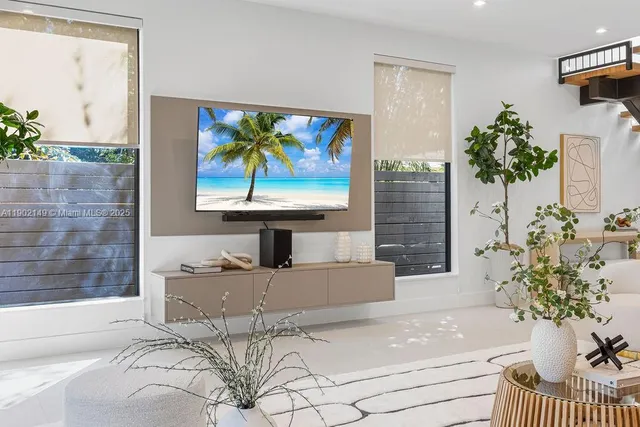 a bedroom with a bed and a lamp next to a window