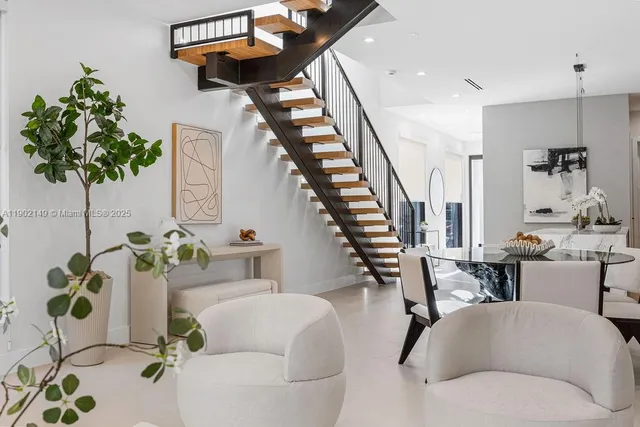 a view of a balcony with wooden floor and fence