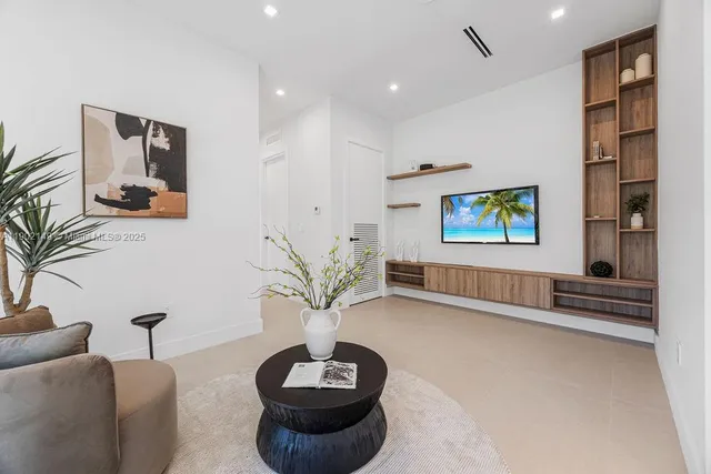 a view of entryway with livingroom and stairs