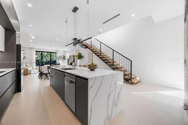 a living room with furniture and a table