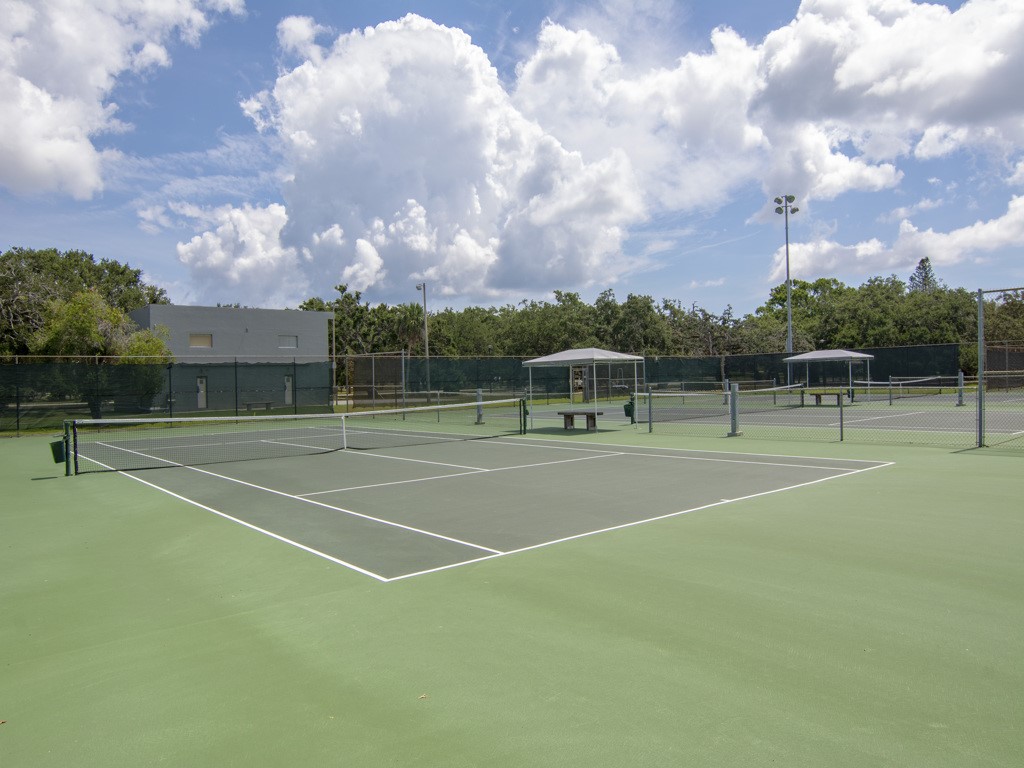 275 Date Palm Road, Unit 304 Vero Beach, FL 32963 - Photo 22 of 36 a view of a tennis court