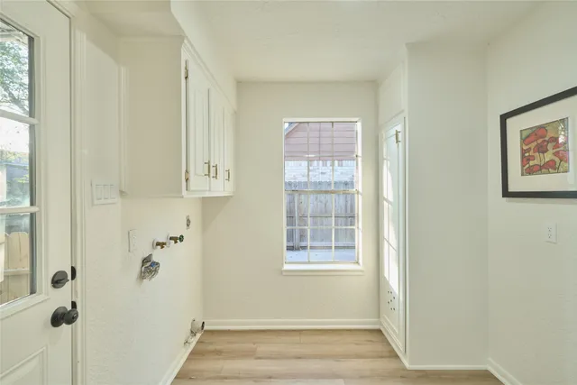 a view of a bathroom with a window