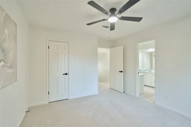 a bathroom with a double vanity sink mirror and double